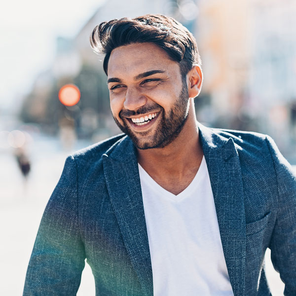 man in suit smiling