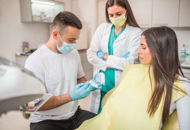 Dental bridge consultation with patient at Elite Smiles of New Lenox in New Lenox, IL