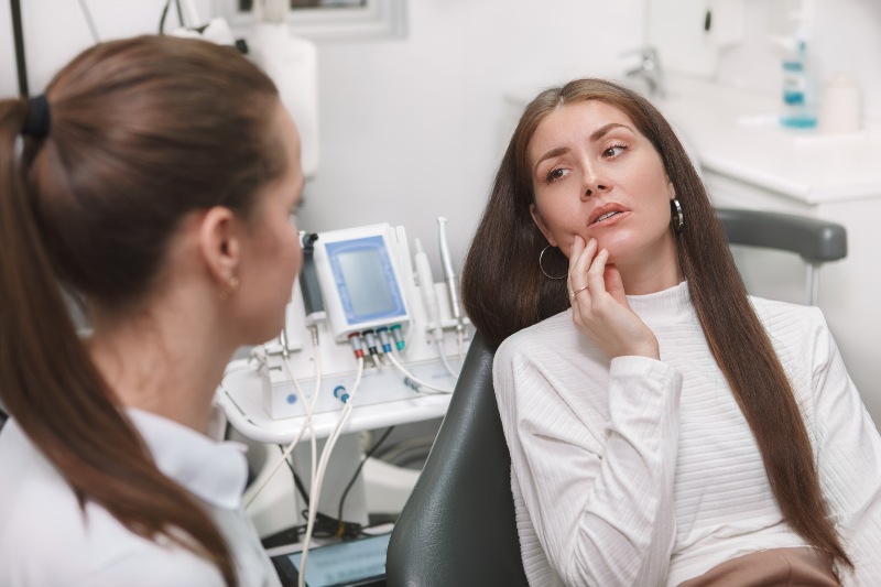 Patient suffering from root canal pain New Lenox, IL